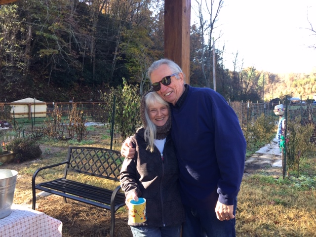 Carol West and David Boje hugging after a fun day
                  at the Full Spectrum Farm